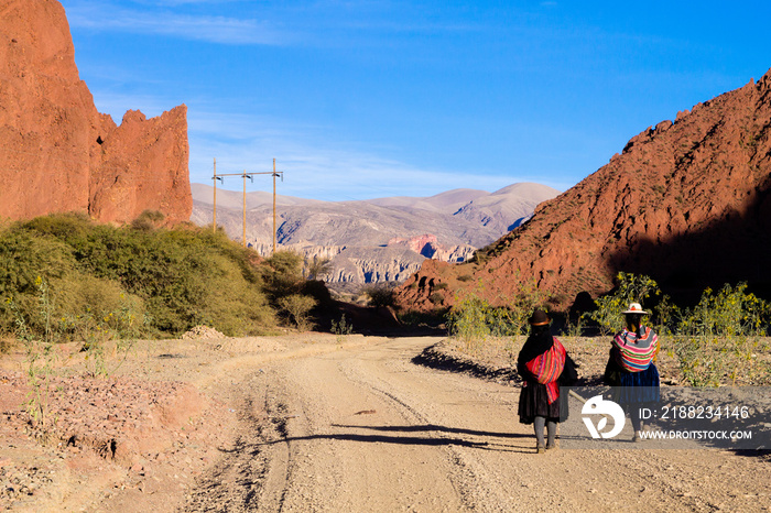 Bolivian people along dirt road,Bolivia