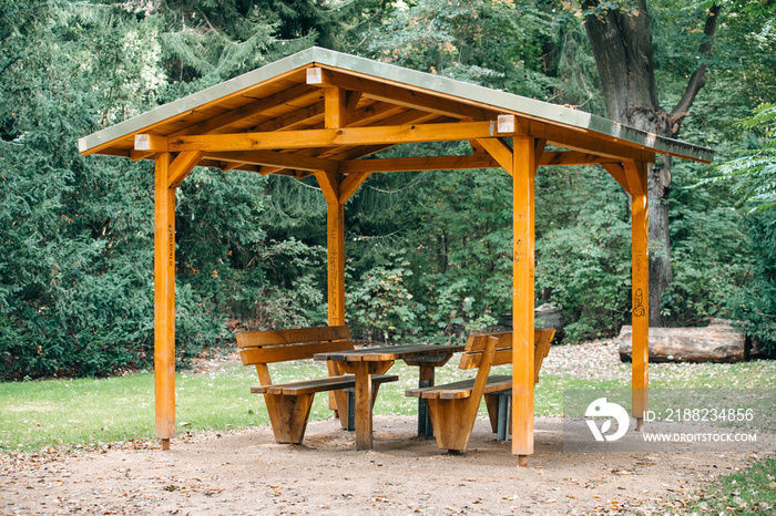 Covered seating area. Gazebo, pergola in parks and gardens - relax and unwind. Wooden gazebo in the Park