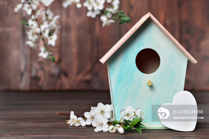 Easter decoration. Bird house and spring flowers