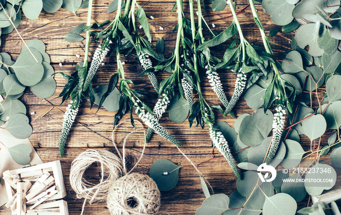 Florist workplace with flower on wooden background