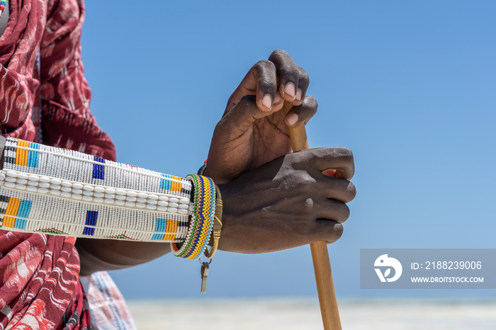 Tribal masai hand with a colorfull bracelet, closeup. Zanzibar, Tanzania, Africa