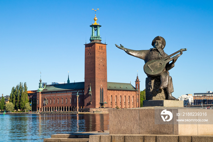 Stockholm City Hall and Evert Taube statue