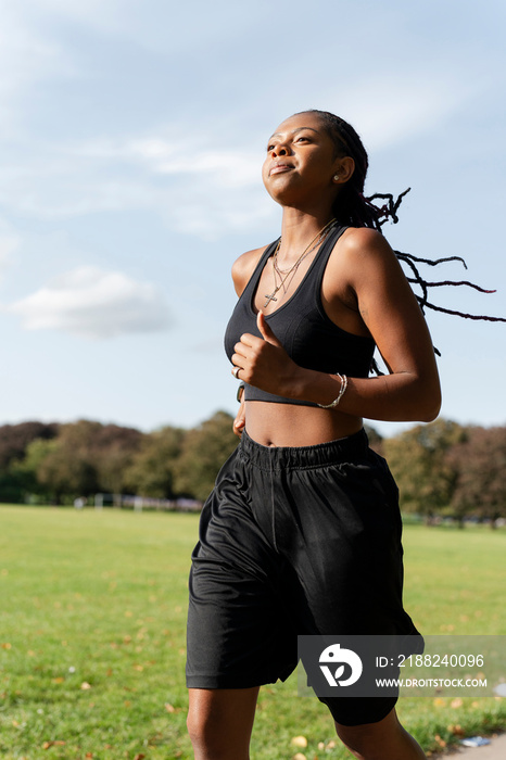 Young woman jogging in park