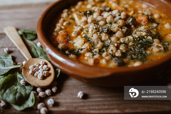 Close up vegan food. Potaje is a typical Spanish food. Chickpeas with chard.