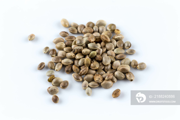 Cannabis hemp seeds pile close up macro shot isolated