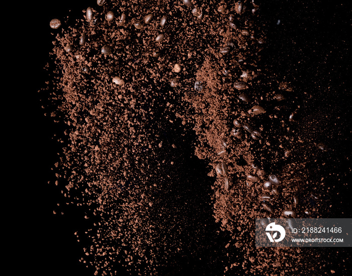 Coffee powder and coffee beans splash or explosion flying in the air