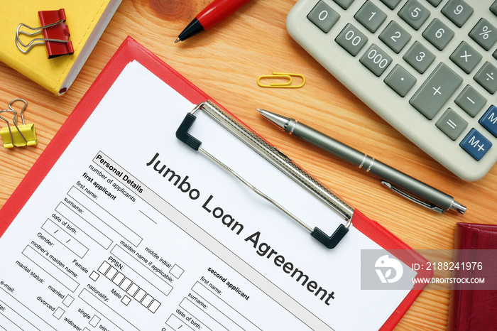 Business concept meaning Jumbo Loan Agreement with sign on the financial document