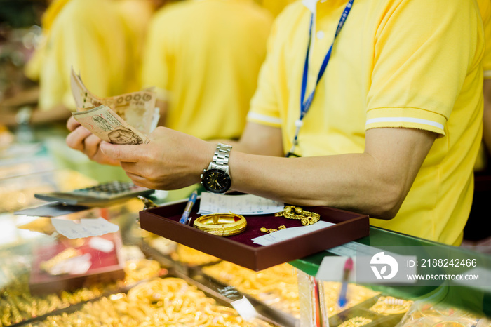 selective focus to staff are counting banknote.