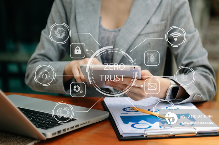 Zero trust security concept Person using computer and tablet with zero trust icon on virtual screen of Data businesses.in office.