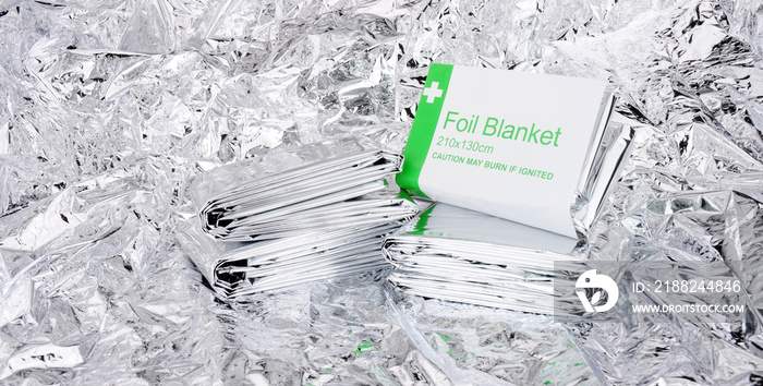 Emergency foil space blankets with a foil background