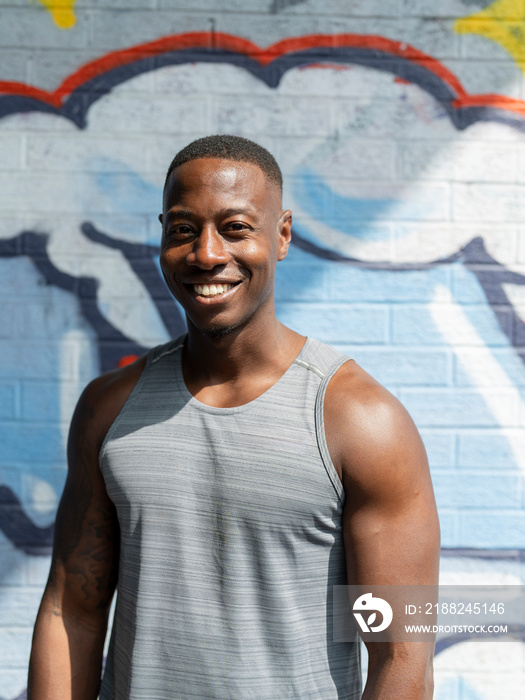 Portrait of muscular man in sports clothing