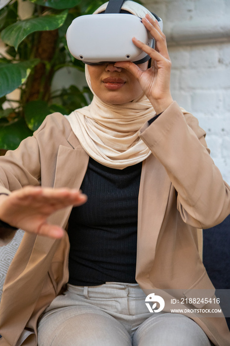 Woman using VR goggles