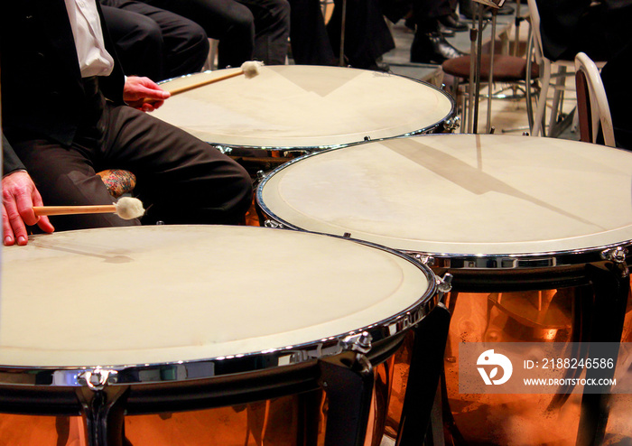 Three large timpani in the orchestra close-up