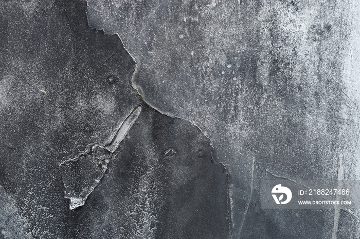 Close up of grungy rough scratched grey metal background