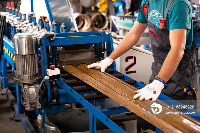 Worker at factory measures works metal production industrial