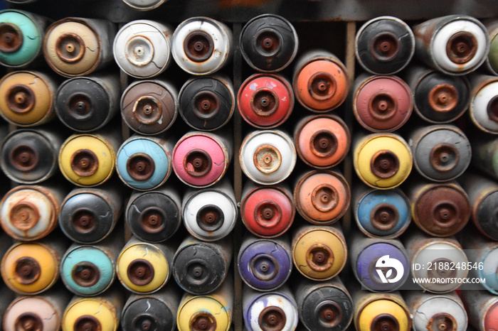 empty spray cans, colorful