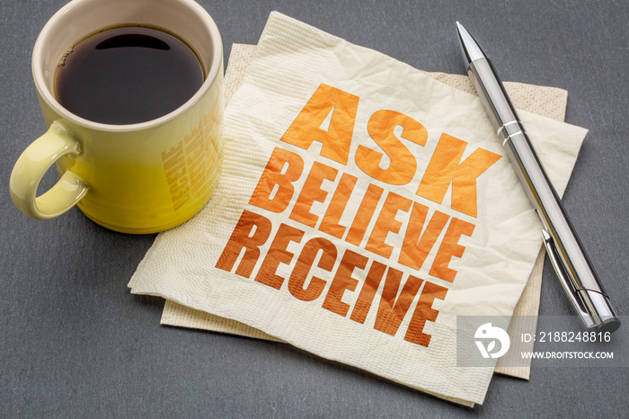 Ask, believe, receive concept on napkin