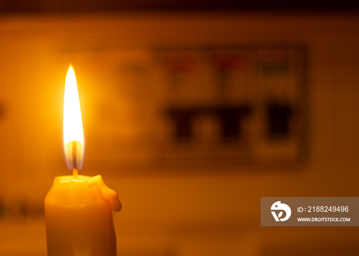 candle and electrical switches, electricity cut-off, blackout