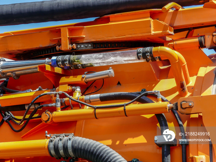 Sewage cleaner machine close up shot on bright sunny day.