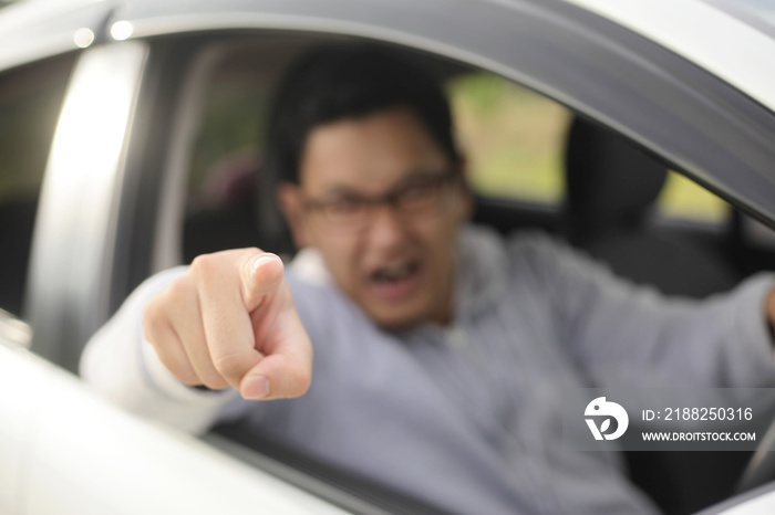 Angry Asian Male Driver, Screaming Pointing From His Car