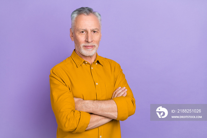 Photo of nice aged grey hairdo man crossed arms wear yellow shirt isolated on purple color background