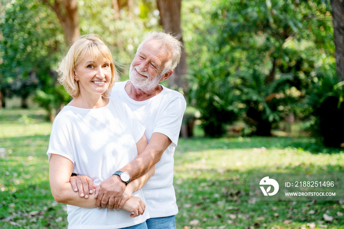 Senior Caucasian Women and men Standing in garden during summer Which is lover who has been caring for long time Take care of health And travel together in retirement Concepcion insured the elderly