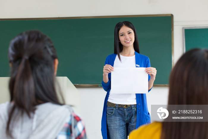 College teacher and students in the classroom