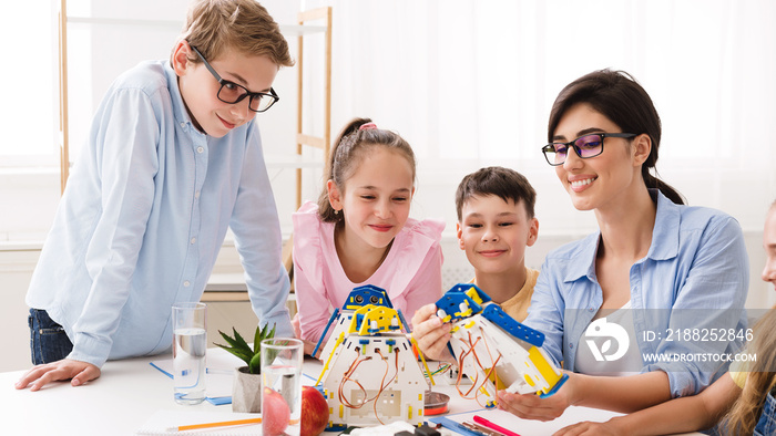 Stem education. Little technicians creating diy robot