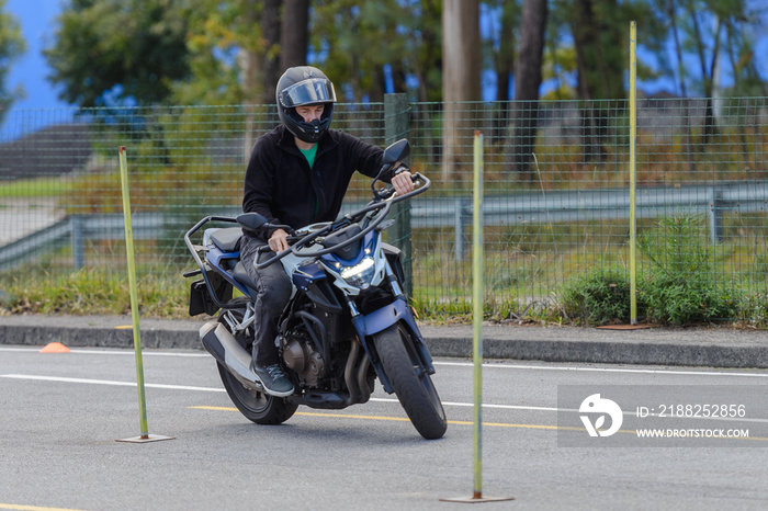 training in a motorcycle school, training in motorcycle control skills