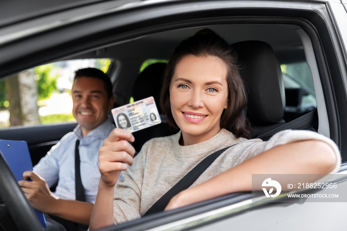 driver courses, exam and people concept - young woman with license and driving school instructor with clipboard in car