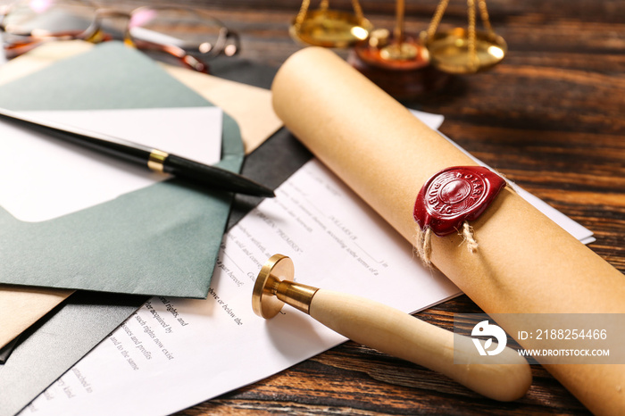 Scroll with wax seal stamp at workplace of notary public