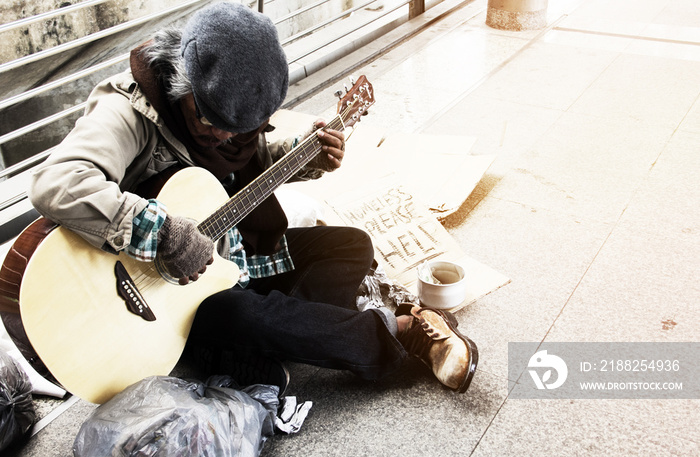 Homeless man on walkway street, Homeless concept.