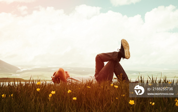 Man on the grass in sunset