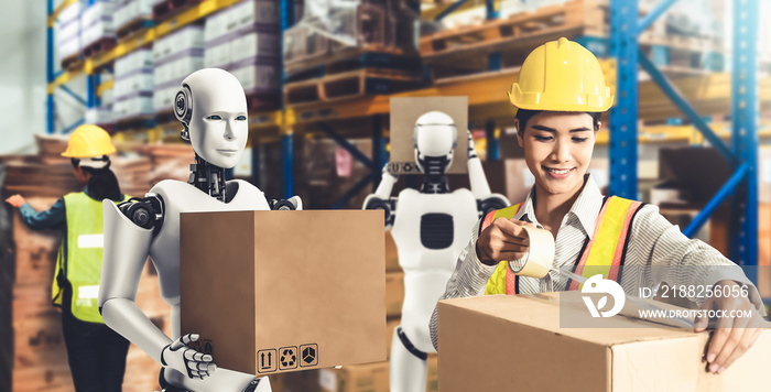 Innovative industry robot working in warehouse together with human worker . Concept of artificial intelligence for industrial revolution and automation manufacturing process .