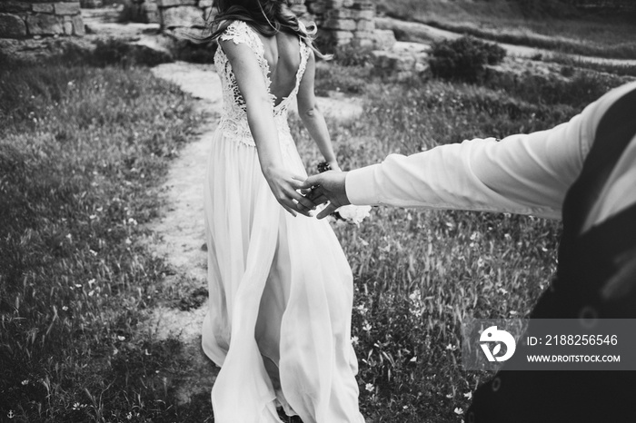 Beautiful wedding couple by the sea