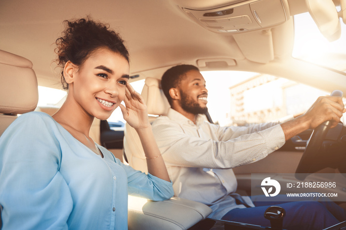 Happy Black Couple Driving Sitting In Car Travelling On Vacation