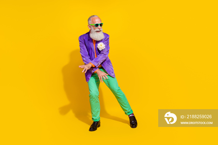 Full body photo of handsome grandparent cool dancing boogie woogie dressed stylish colorful garment isolated on yellow color background