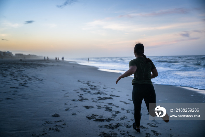 Marine veteran trains every morning on the beach to stay in shape just like when she was on active duty.