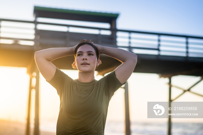 Marine veteran trains every morning on the beach to stay in shape just like when she was on active duty.