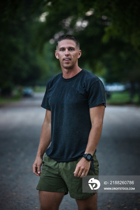 Air Force service member sets out for a morning run to train for his PT Fitness test.