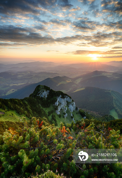 Sunrise on mountain at summer