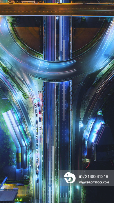 Expressway top view, Road traffic an important infrastructure , car traffic transportation above intersection road in city night, aerial view cityscape of advanced innovation