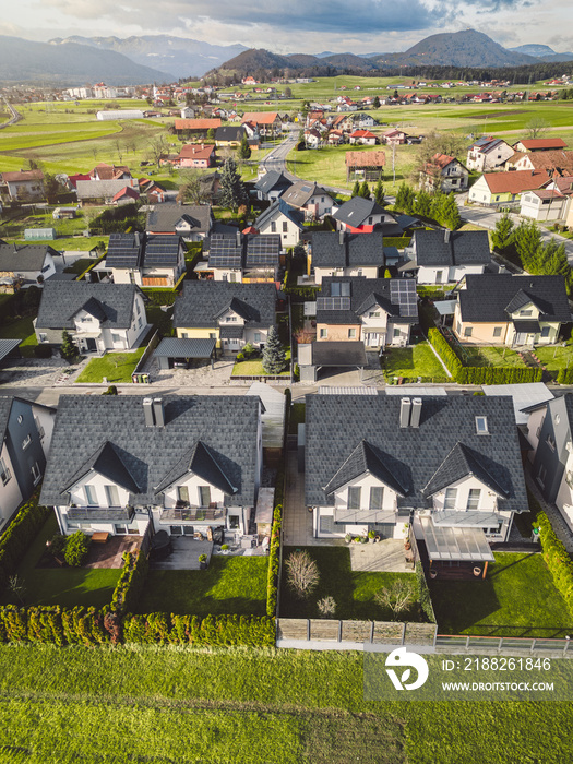 Vertical photo, aerial view of new houses, family homes in the suburbs of Slovenia