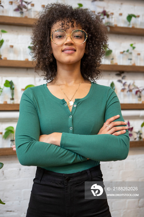 Portrait of smiling woman in flower shop