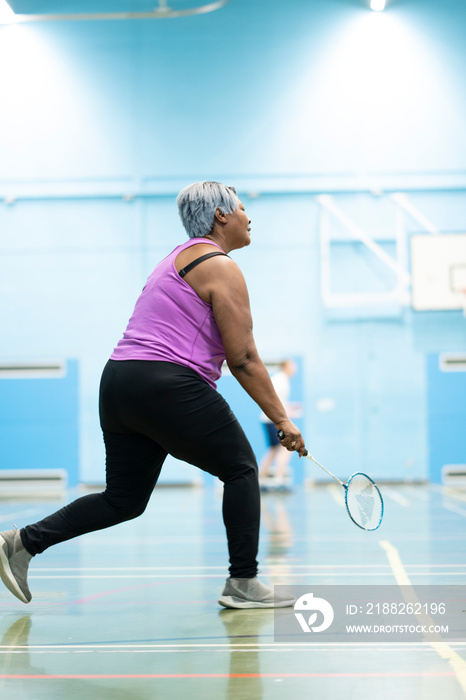 Woman playing badminton