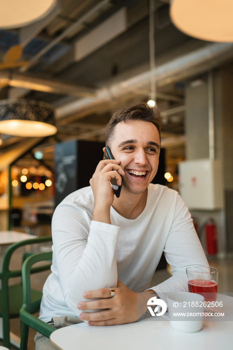 one man young adult caucasian using mobile phone smartphone