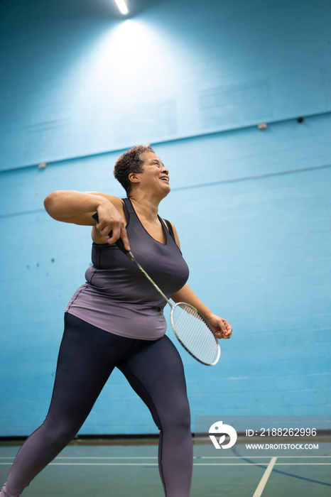 Woman playing badminton