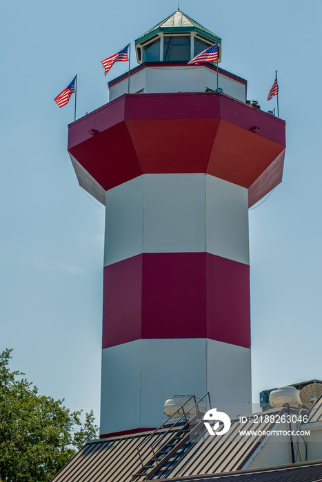 A clear blue sky features the Harbour Town Lighthouse - famous l