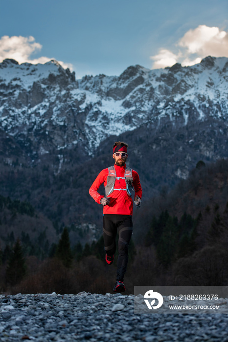 Long distance running athlete during a cold mountain workout