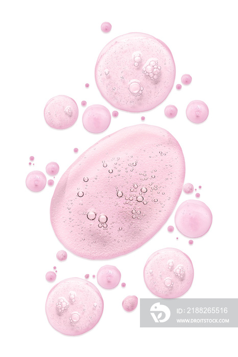 Drops of pink cosmetic serum on white background